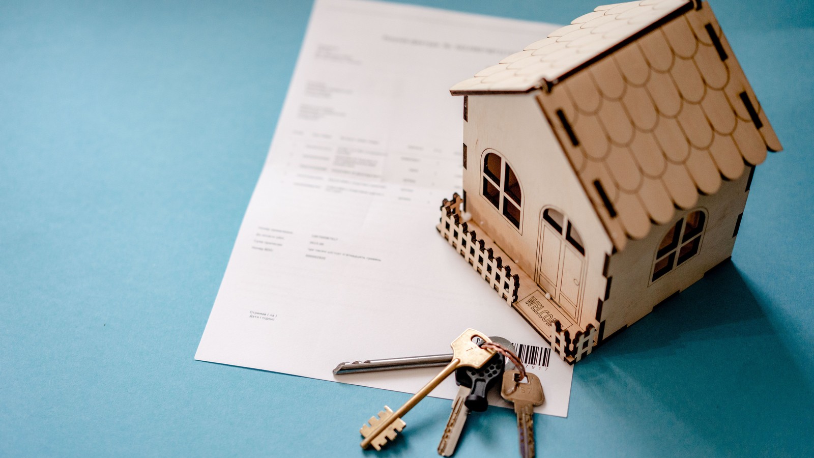 House model, keys and property documents