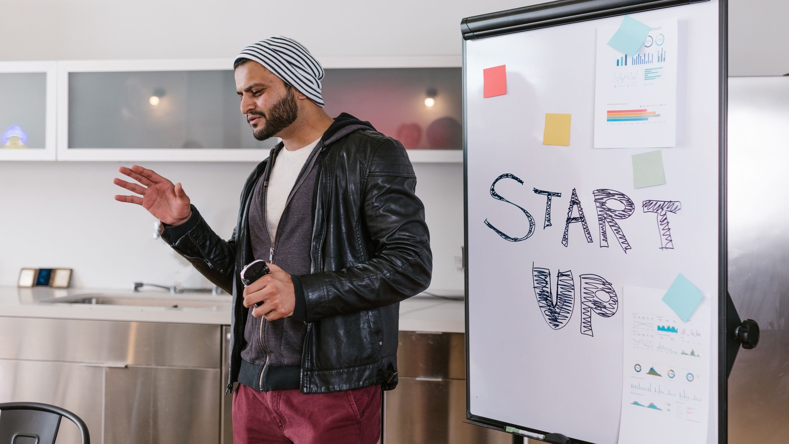 Startup founders preparing investor documents in a data room