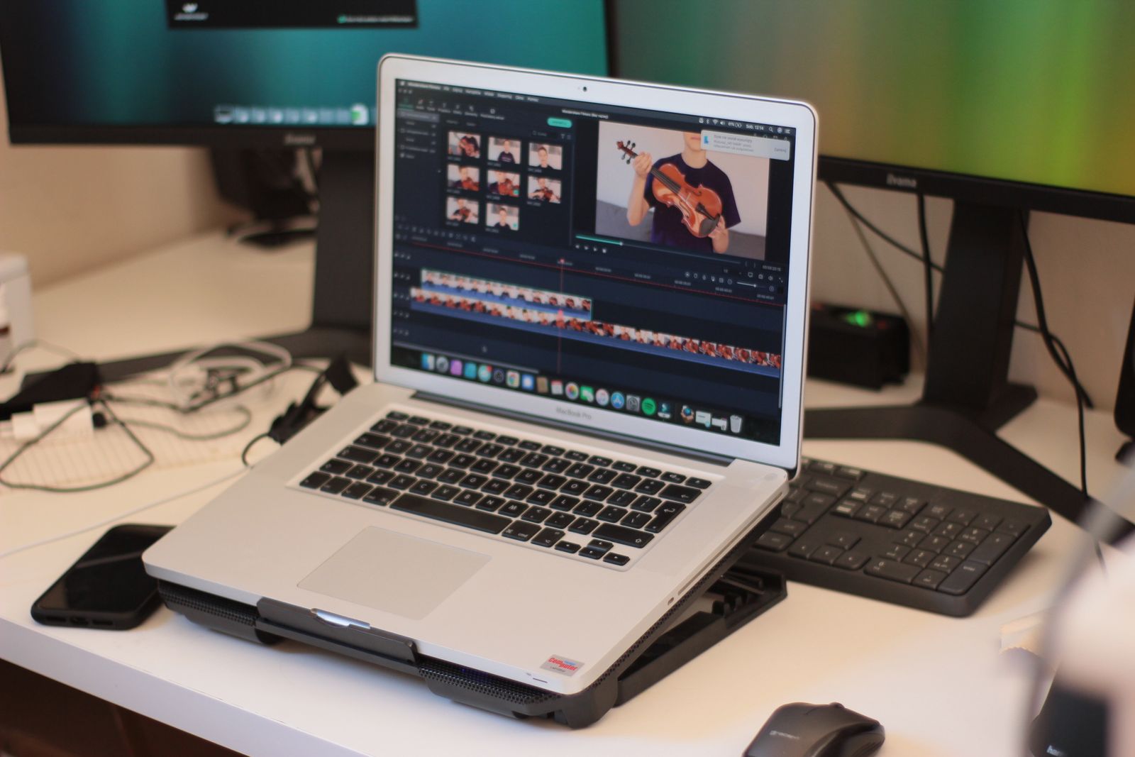 Laptop showing a video-editing workspace
