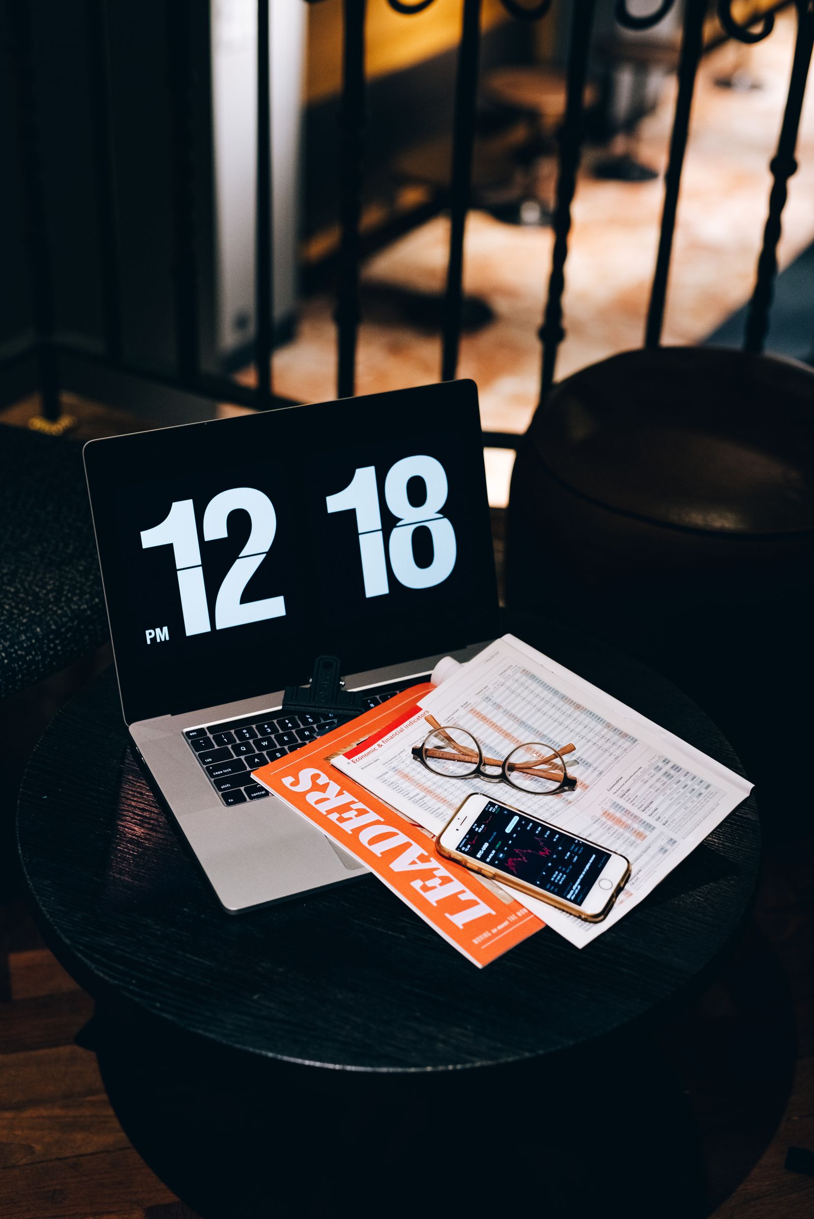 Laptop, phone and business papers