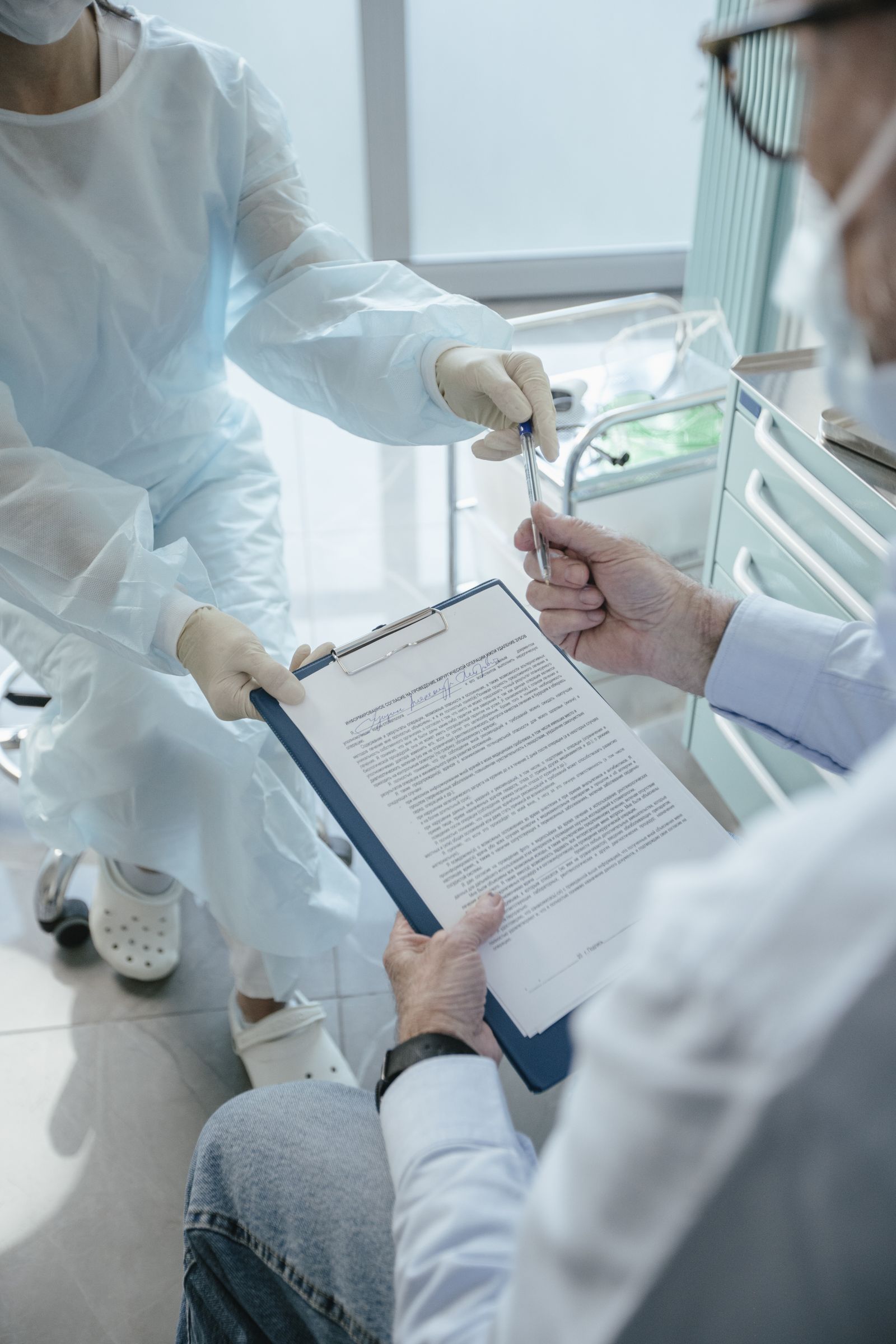 Doctor and patient reviewing a document