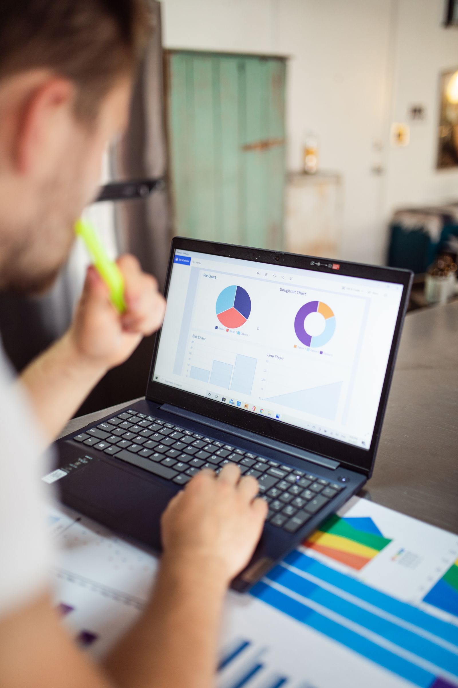 Charts and graphs on a laptop screen