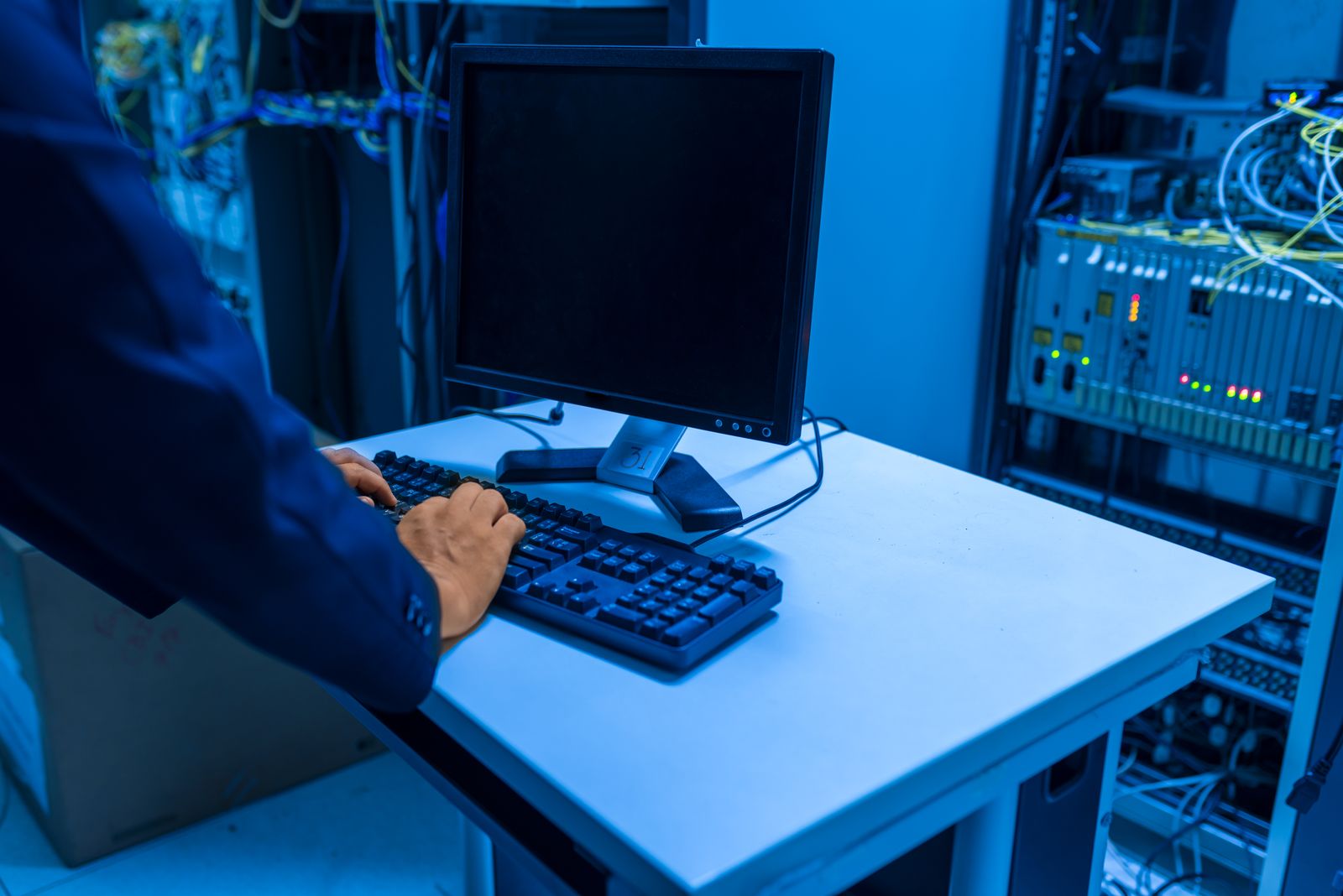 Security operations professional working in a data center