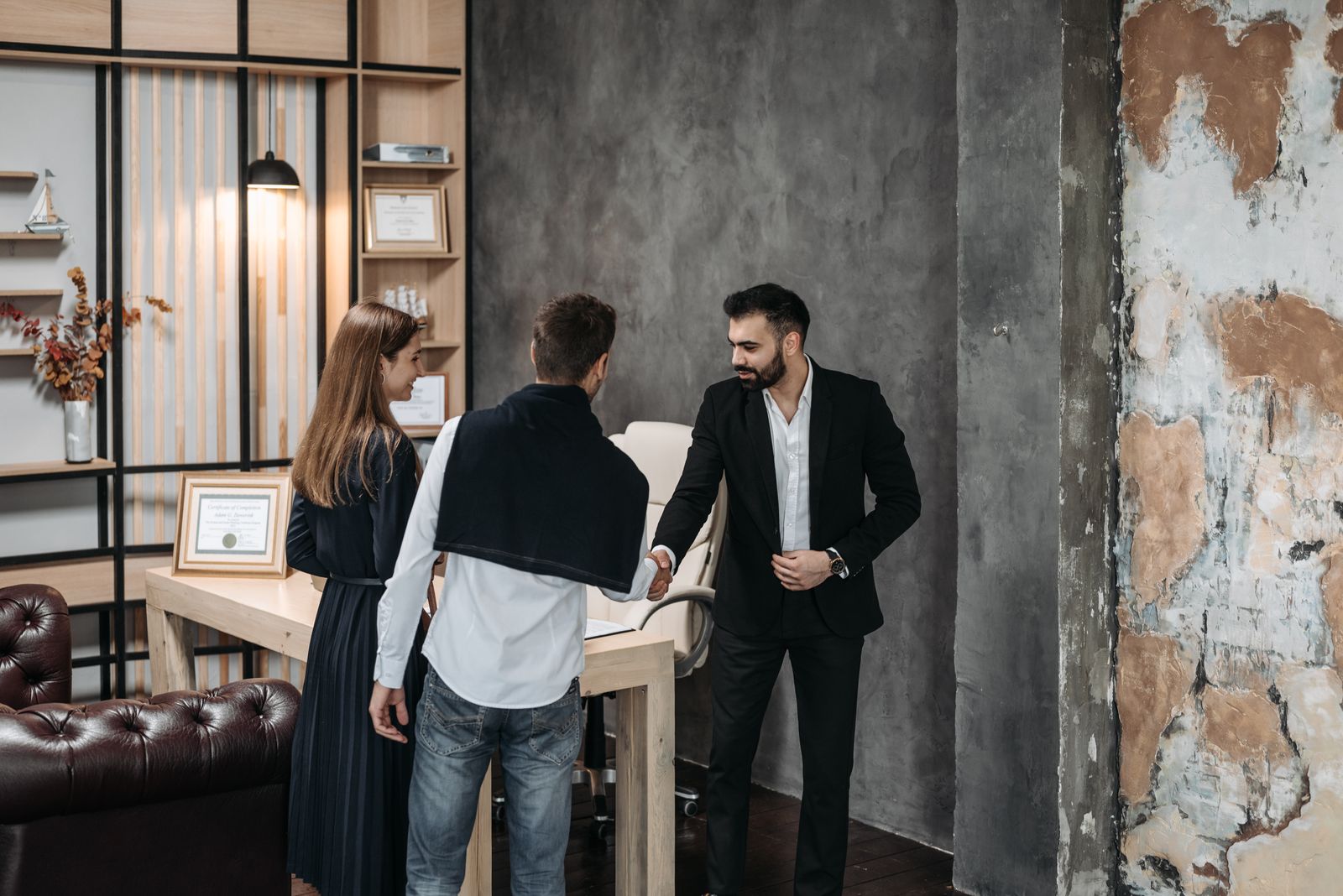 Lawyer meeting clients to review matter documents and responsibilities
