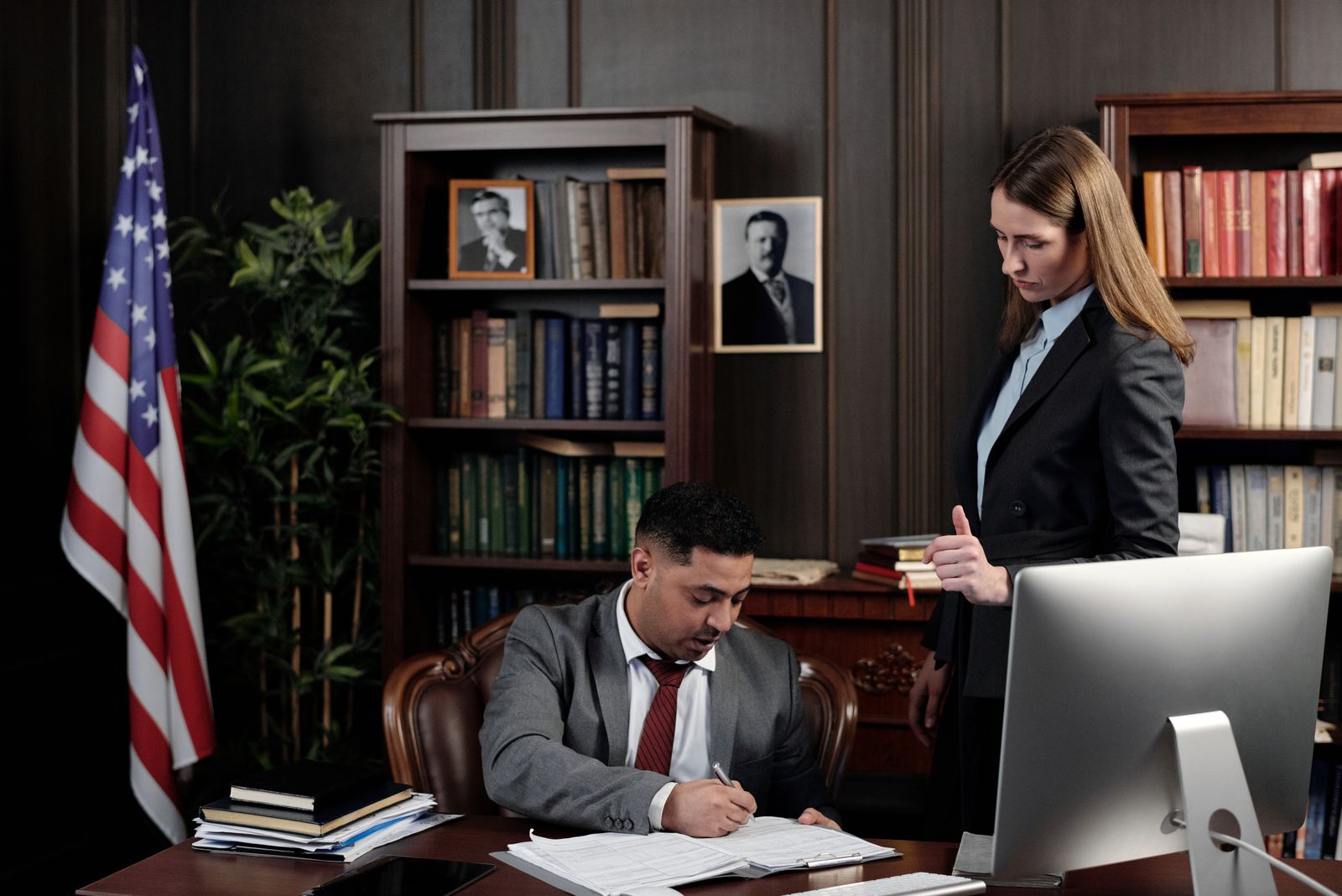Legal team reviewing confidential case and transaction documents