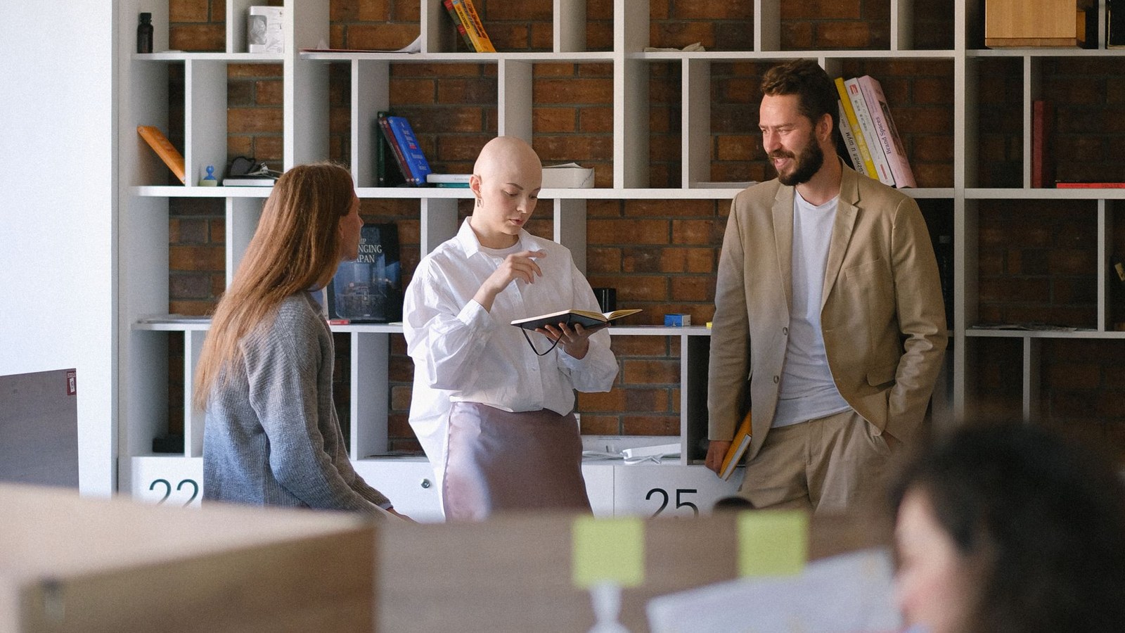 Startup founders preparing investor documents in a data room