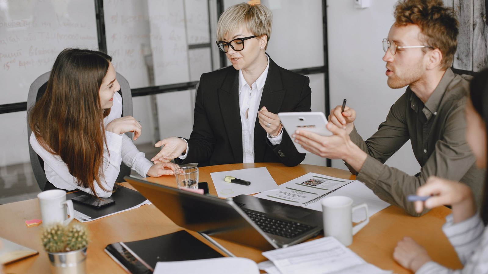 Startup founders meeting to review fundraising documents